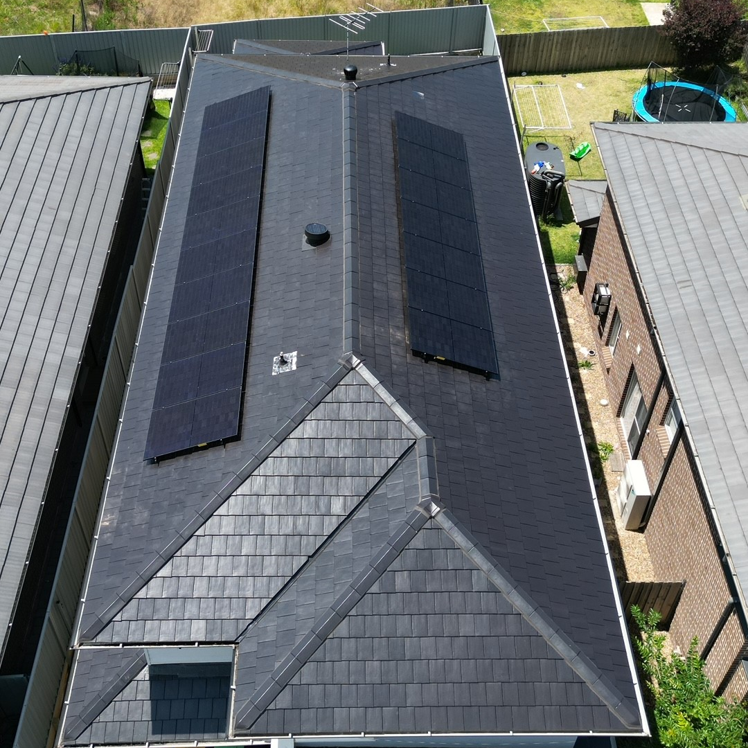Max Power Solar 415Watt Panels an a dark concrete tile roof